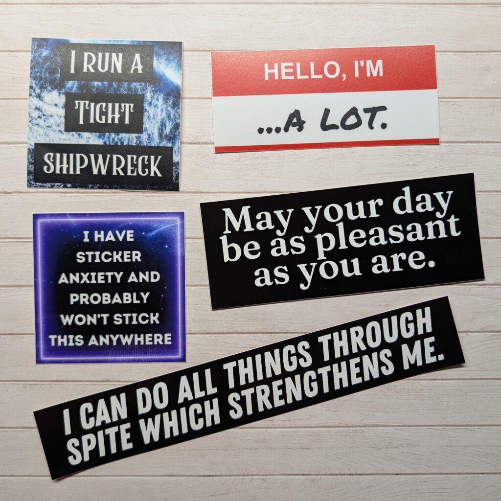 Five stickers with various sayings.